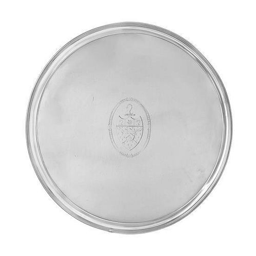 * A George III Silver Salver, Thomas Graham & Jacob Willis, London, 1790, of circular form with a reeded rim, the field cente