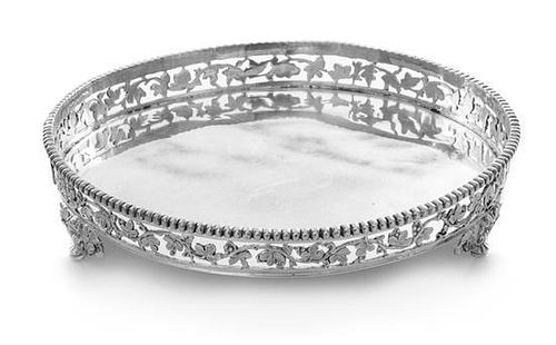 * A French Silver Wine Coaster, Alphonse Debain, Paris, First Quarter 20th Century, having a beaded rim and an openwork galle