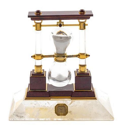 A French Carved Jasper, Rock Crystal, Diamond and Silver-Gilt Desk Clock Height 12 1/4 x width 12 1/4 inches.