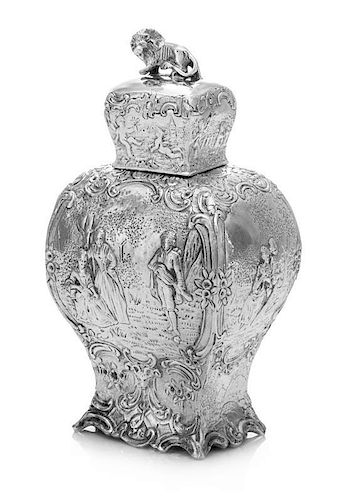 * A German Silver Tea Caddy, Wolf & Knell, Hanau, Late 19th/Early 20th Century, of baluster form with a lion finial, the body
