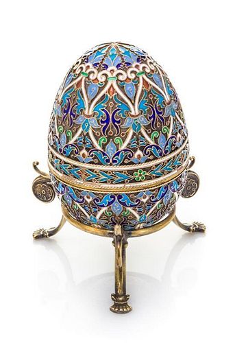 A Russian Enameled Silver Egg, Mark of Ivan Khlebnikov with Imperial Warrant, Moscow, Late 19th/Early 20th Century, the case