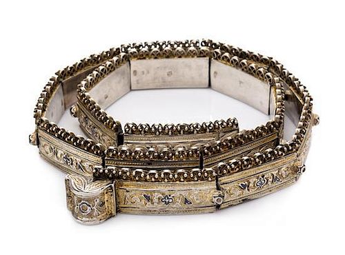 * A Russian Niello Silver Belt, Tbilisi, Early 20th Century, having a beaded and filigree decorated top, the bands worked wit