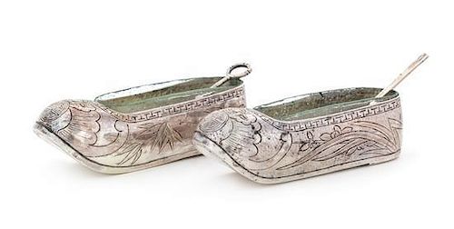 * A Pair of Chinese Export Silver Salts, Maker's Mark SW, 19th Century, each in the form of a shoe engraved to show bamboo br