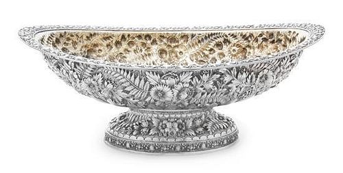 * An American Silver Center Bowl, Tiffany & Co., New York, NY, the rim worked to show rocaille and C-scroll elements, the bod