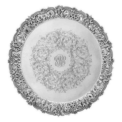 * An American Silver Salver, S. Kirk & Son, Baltimore, MD, the rim worked to show rocaille and C-scrolls enclosing the floral
