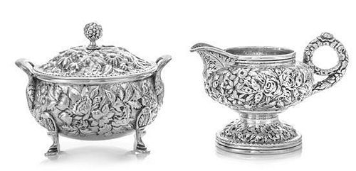 * An American Silver Creamer and Covered Sugar, S. Kirk & Son, Baltimore, MD, each worked with repousse floral and foliate de