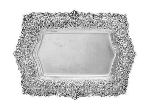 * An American Silver Serving Tray, Bailey, Banks & Biddle, Philadelphia, PA, 1889, the rim worked with C-scroll and volute mo