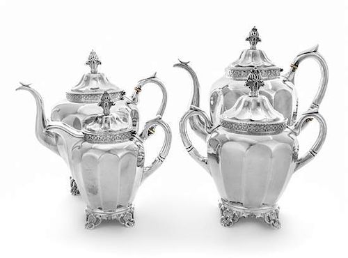 * An American Coin Silver Four-Piece Tea and Coffee Service, Wood & Hughes, New York, NY, 19th Century, comprising a teapot, 