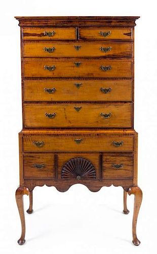 A Queen Anne Tiger Maple Highboy Height 72 3/8 x width 39 3/4 x depth 20 1/2 inches.