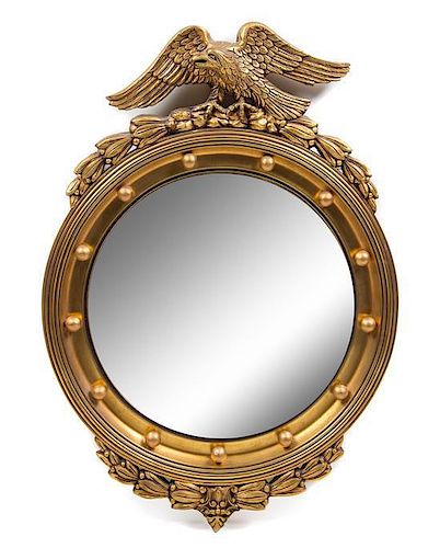 A Federal Style Giltwood Bullseye Mirror Height 33 x width 23 1/4 inches.