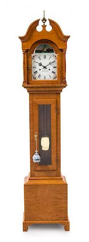 An American Maple Dwarf Tall Clock Height 60 1/4 x width 13 1/2 x 8 inches.
