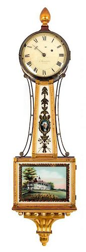 A Federal Style Mahogany and Parcel Gilt Banjo Clock Height 40 1/2 inches.