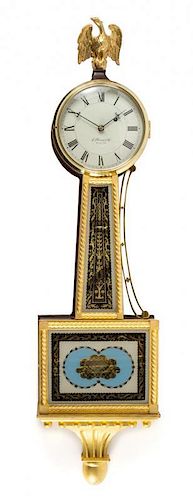 A Federal Style Mahogany and Parcel Gilt Banjo Clock Height 42 inches.