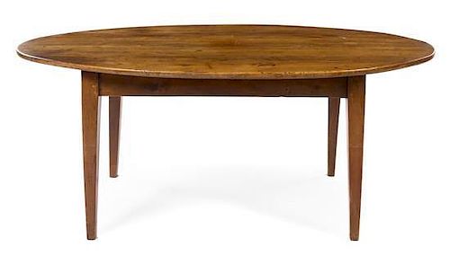 A Provincial Style Breakfast Table Height 29 3/8 x width 73 x depth 37 1/4 inches.
