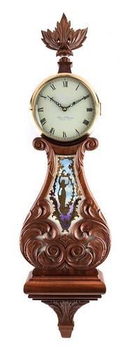 An American Mahogany Lyre Clock Height 43 inches.