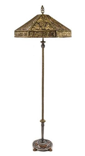 * An American Pierced Brass Floor Lamp Height 67 x diameter of shade 26 inches.