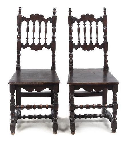 A Pair of Jacobean Style Carved Oak Side Chairs