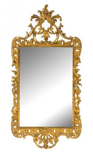 * A George II Giltwood Mirror Height 50 1/4 x width 24 7/8 inches.