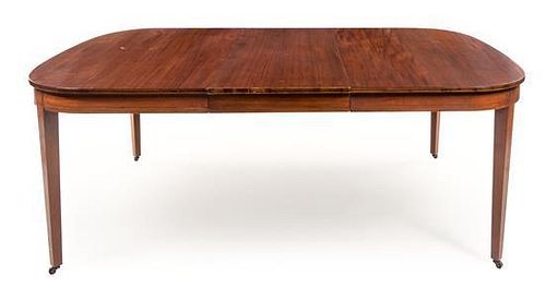 A Regency Style Mahogany Extension Dining Table Height 29 3/4 x width 60 x depth 54 1/4 inches.