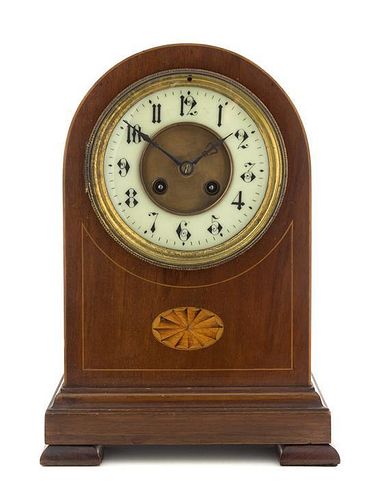 A Regency Style Mahogany Mantel Clock Height 12 inches.