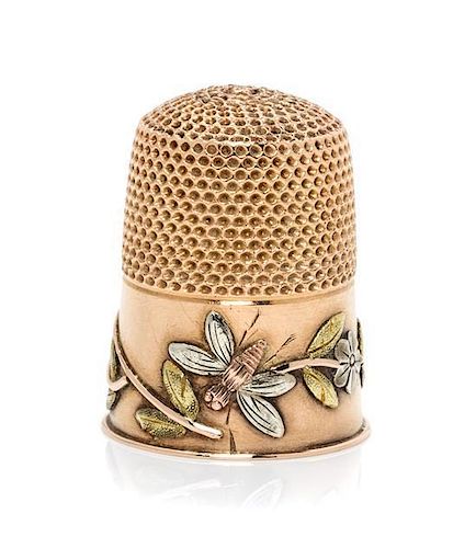 * An American 14-Karat Tri-Colored Gold Bee Thimble, Carter, Gough & Co., Newark, NJ, the knurled top and body above a rose,
