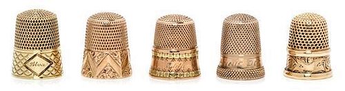 * Five American Gold Thimbles, Various Makers, comprising an example with a bi-color gold band to the base, Stern Bros., New