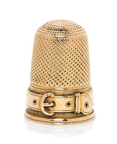 * A Continental Yellow Gold Thimble, , the knurled top and diapered body above a band in the form of a belt, engraved Josephi