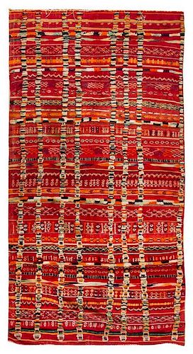 * An Afghan Wool Rug 11 feet 1 inch x 5 feet 6 3/4 inches.