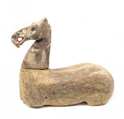 A Pottery Figure of a Horse