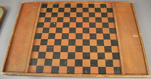 Primitive game board in old black and red paint. 
18 3/4" x 28 3/4"