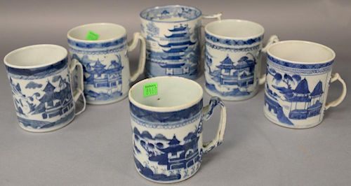 Group of six blue and white porcelain mugs in willow pattern, five Canton and one Staffordshire transfer decorated.  Canton: 