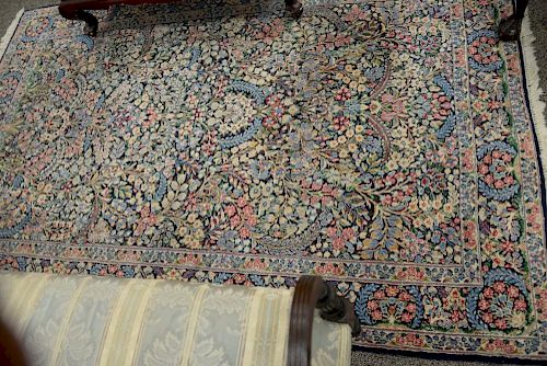 Kirman Oriental area rug. 
5'4" x 8'4"