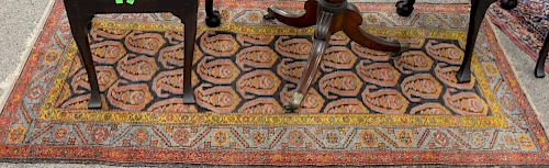 Oriental throw rug. 
3'4" x 6'8"