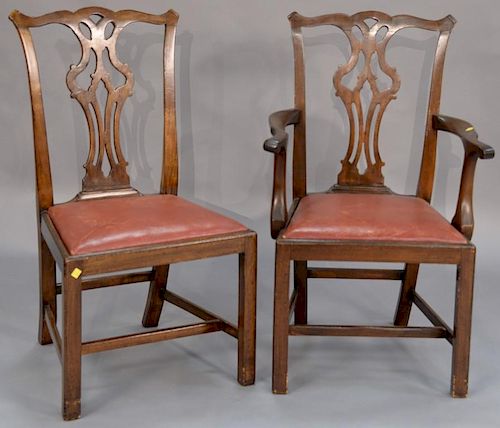 Set of ten Regency Chippendale style mahogany dining chairs with slip seat and stretcher base.