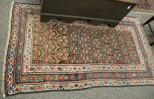 Oriental throw rug. 
3'8" x 6'8"