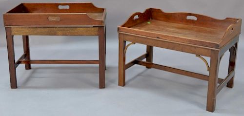 Two George IV mahogany serving trays now set on custom coffee table type stands. 
ht. 22in., top: 16 1/4" x 26 1/2" 
ht. 20in