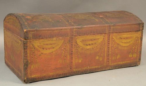 Decorated dome top box, 19th century, red painted with yellow and black curtain design.  ht. 10in., lg. 22 3/4in., dp. 11 1/2