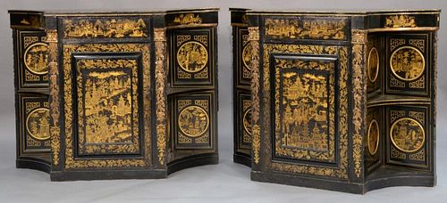 Pair of lacquered Chinese side cabinets having shaped top over conforming case, one drawer over one door flanked with carved 