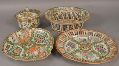 Four piece Rose Medallion porcelain lot to include reticulated bowl and underplate, a shaped dish, and covered bowl. 
reticul
