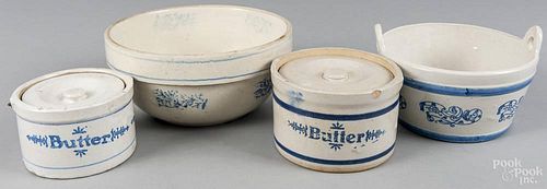Four pieces of blue and white stoneware, late 19th c., to include a mixing bowl, two butter crocks,