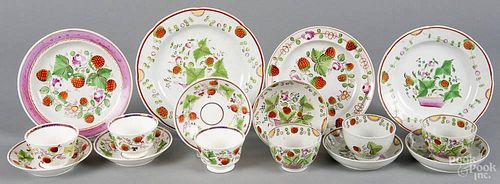 Sixteen pieces of Staffordshire porcelain, 19th c., in a strawberry pattern, largest plate - 9 3/4''