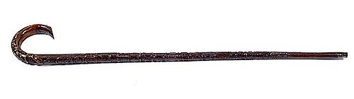 28. Spanish-American War Folk Art Cane- Ca. 1900- This cane is carved in high relief and has portraits of both Admiral George