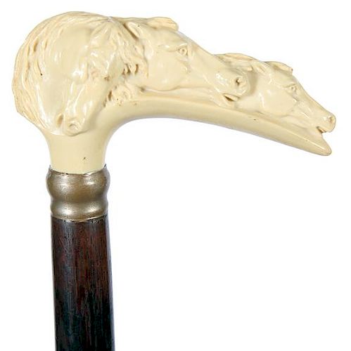 39. Celluloid Horse Cane- Ca. 1940- A three horse handle in pristine condition, a metal collar marked German silver, exotic h