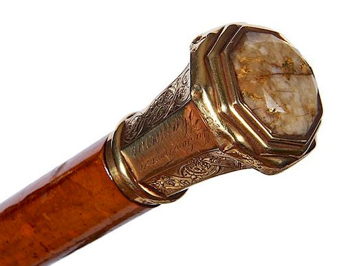 50. Gold Quartz Cane-Dated 1855- A nice presentation gold dress cane with a large hexagonal quartz nugget atop, the presentat
