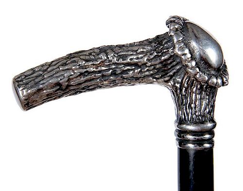 63. Silver Crown Stag Cane- 20th Century- A well cast silver handle by the well known cane artist Keith Cowey of London, ribb
