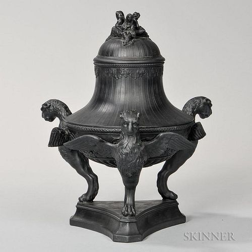 Wedgwood Black Basalt Tripod Vase and Cover, England, 19th century, engine-turned cover and bowl, the cover set with three Sy