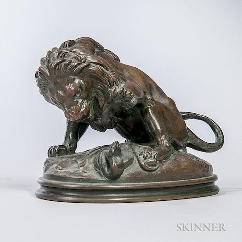 After Antoine-Louis Barye (French, 1795-1875)  Bronze Figure of a Lion and Snake, lion depicted with paw raised, on a stepped