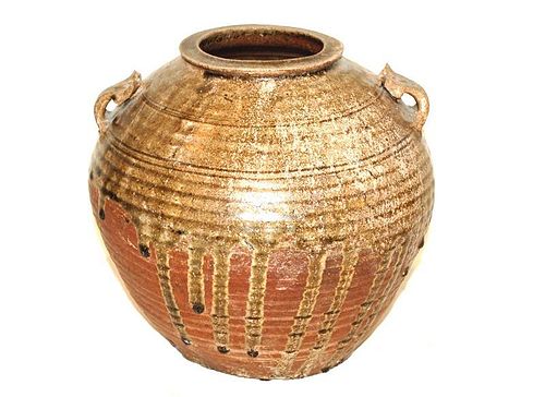 A Chinese Drip Glaze Urn, Jin or Han Dynasty
