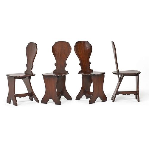 SET OF FOUR GEORGE II STYLE MAHOGANY HALL CHAIRS
