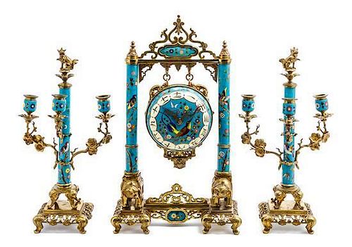 A French Gilt Bronze and Cloisonne Clock Garniture ATTRIBUTED TO EDOUARD LIEVRE, PARIS, LATE 19TH CENTURY, MOVEMENT BY JAPY FRER